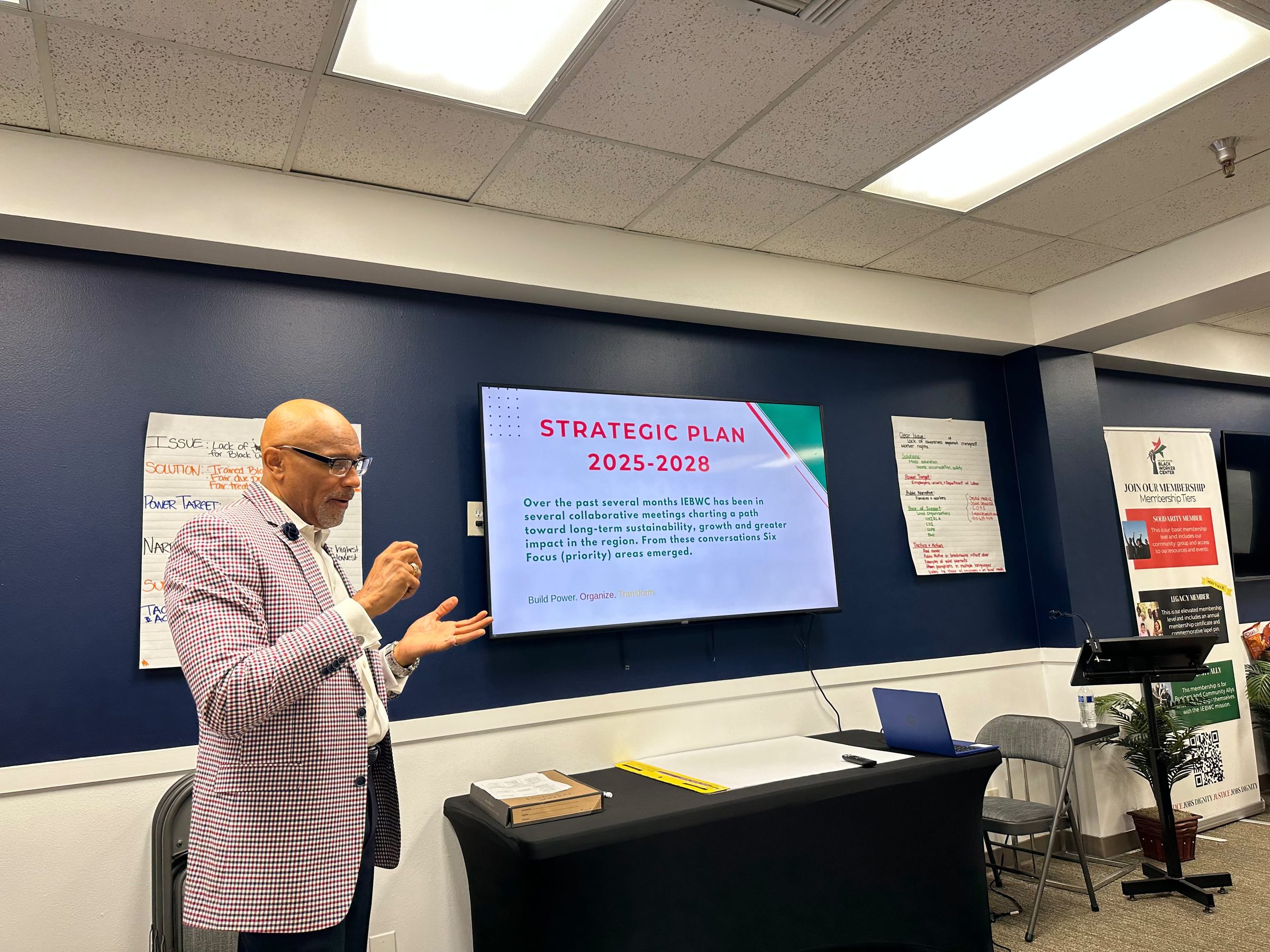 Dr. Nos leading a strategic planning session